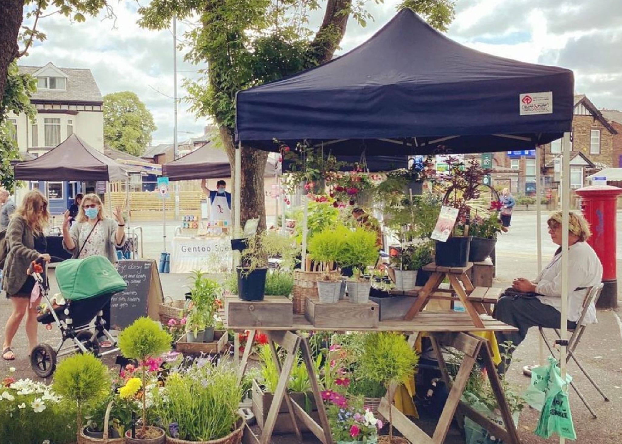 small pop up gazebo used by a market trader and supplied by surf & turf instant shelters